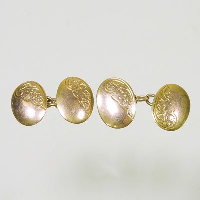 Lot 77 - A pair of 9 carat gold cufflinks, each of oval...