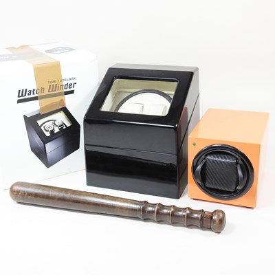 Lot 351 - An automatic watch winder, boxed, together...