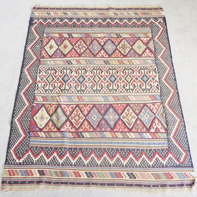 Lot 247 - A kelim rug, with coloured designs, 208 x 153cm