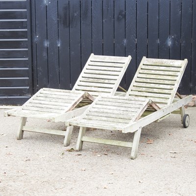 Lot 13 - A pair of Lindsey teak garden loungers (2)