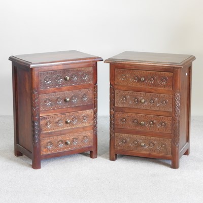 Lot 171 - A pair of Eastern carved hardwood bedside...