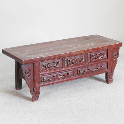 Lot 101 - A Chinese carved and painted opium table