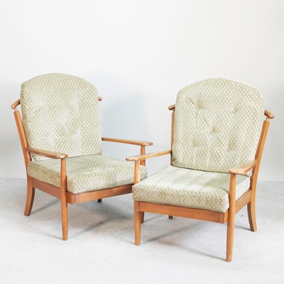 Lot 212 - A pair of mid century armchairs, with green...