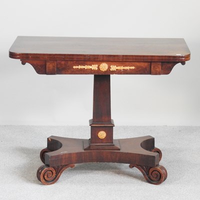 Lot 315 - A 19th century French folding card table, on a...
