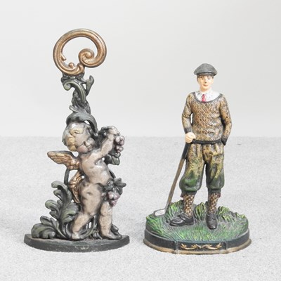 Lot 223 - A painted cast iron doorstop, 42cm high,...