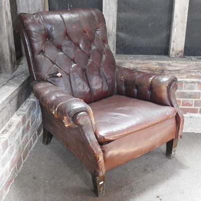Lot 4 - An early 20th century brown upholstered button back club armchair