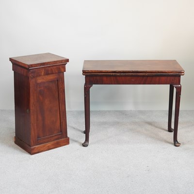 Lot 370 - A George III mahogany folding tea table, on...