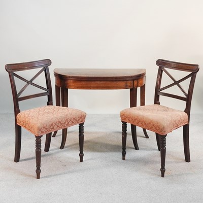 Lot 359 - A Regency mahogany and ebony strung folding...