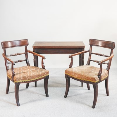 Lot 529 - A Regency mahogany folding card table, on ring...