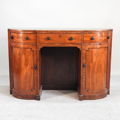 Lot 637 - A 19th century mahogany bow front pedestal...