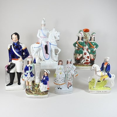 Lot 210 - A collection of 19th century Staffordshire pottery flatback figures