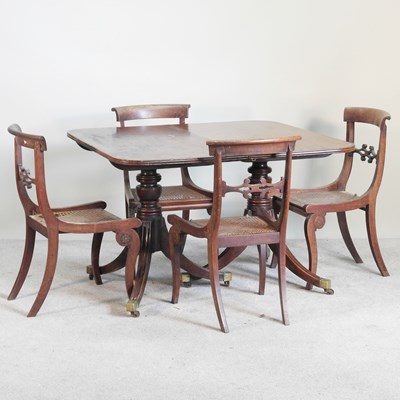 Lot 335 - A Regency mahogany twin pedestal dining table,...