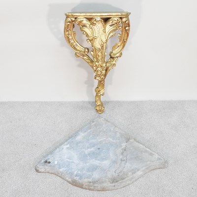 Lot 381 - A 19th century carved and gilt wood marble top...