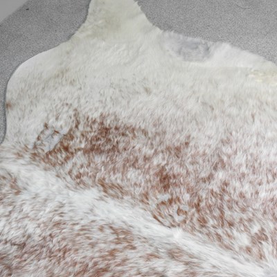 Lot 20 - A cow hide rug, 244 x 186cm