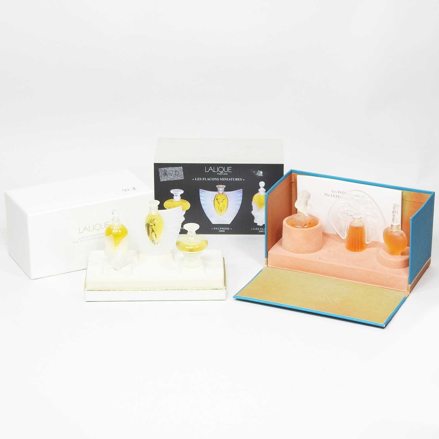 Lot 35 - A set of Lalique miniature perfumes, Les...