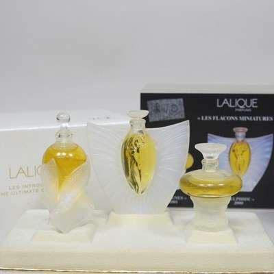 Lot 35 - A set of Lalique miniature perfumes, Les...