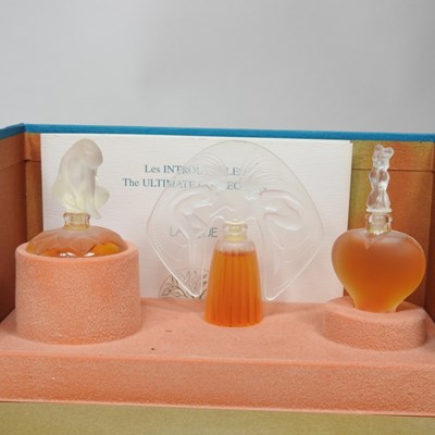Lot 35 - A set of Lalique miniature perfumes, Les...