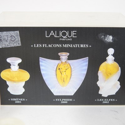Lot 35 - A set of Lalique miniature perfumes, Les...