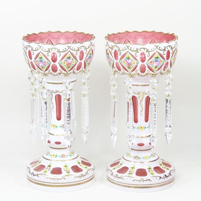 Lot 110 - A pair of Bohemian white overlaid ruby glass...