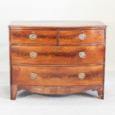 Lot 316 - A 19th century mahogany bow front chest, on...