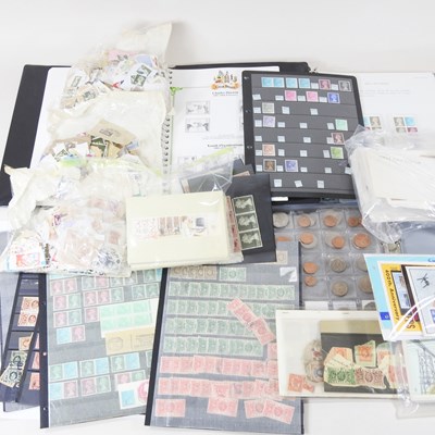 Lot 227 - A collection of stamps and coins, to include...