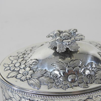 Lot 8 - A George III silver tea caddy, of oval shape...