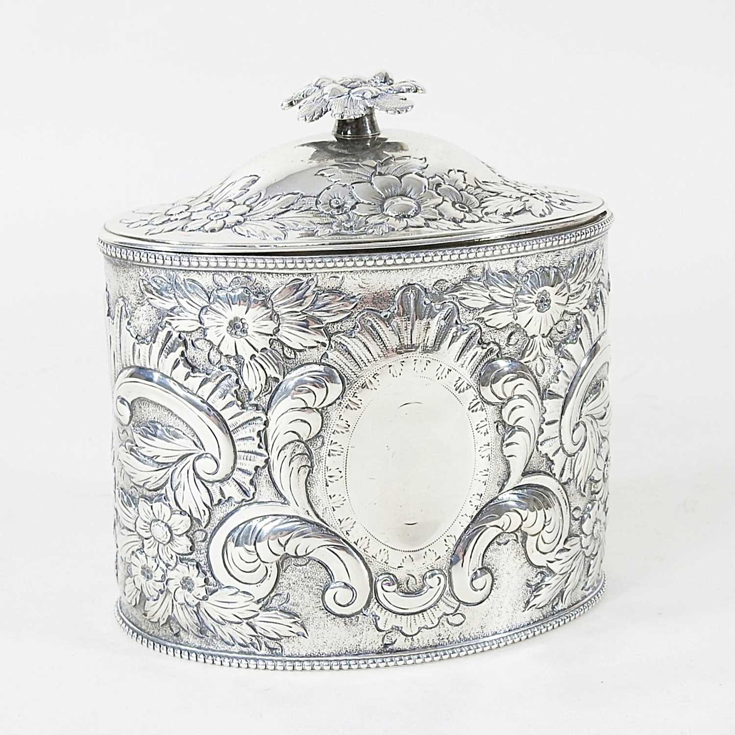 Lot 8 - A George III silver tea caddy, of oval shape...