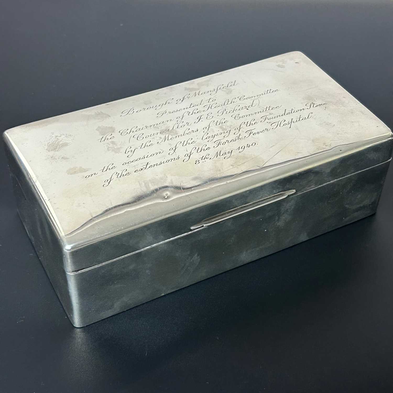 Lot 1 - A silver table cigarette box, with...