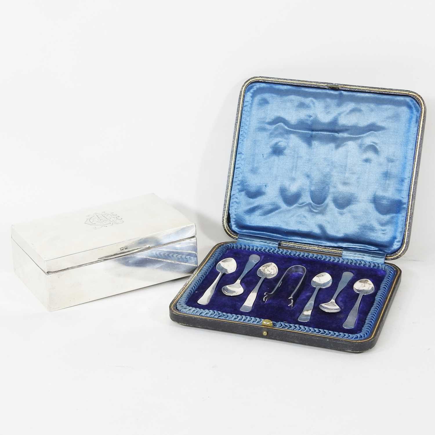 Lot 11 - An early 20th century silver table cigarette...