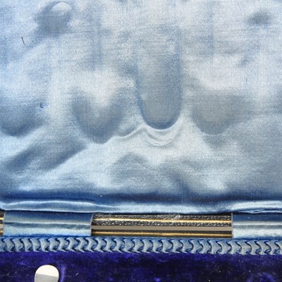 Lot 11 - An early 20th century silver table cigarette...