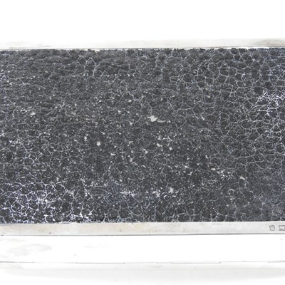 Lot 11 - An early 20th century silver table cigarette...