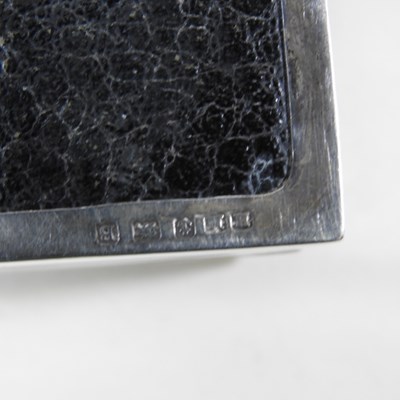 Lot 11 - An early 20th century silver table cigarette...