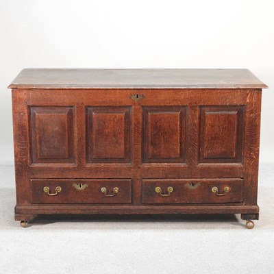 Lot 463 - An 18th century oak mule chest, with a hinged...