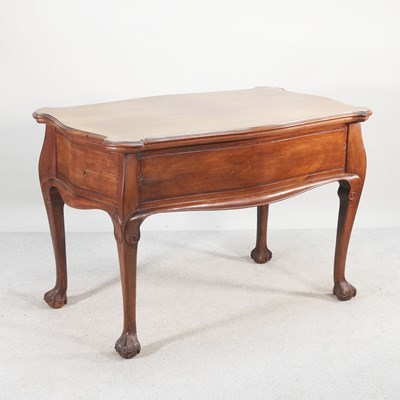 Lot 332 - An early 20th century walnut serpentine...