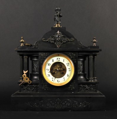 Lot 497 - A Victorian black slate mantel clock, of...