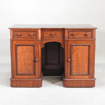 Lot 416 - A Victorian mahogany inverted breakfront...