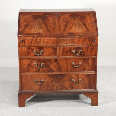 Lot 496 - An 18th century mahogany bureau, fitted with a...
