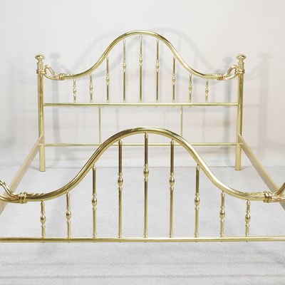 Lot 491 - A modern brass bed surround