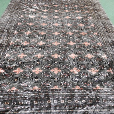 Lot 408 - A Bokhara carpet, with rows of medallions on a...
