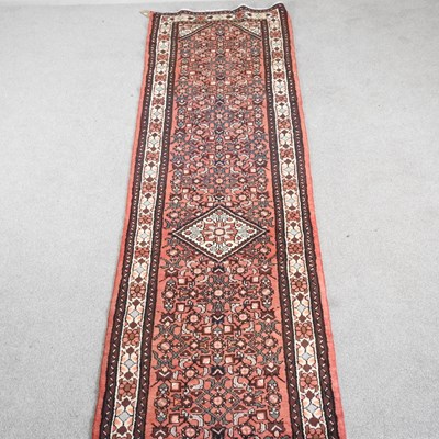 Lot 718 - A Persian Malayer runner, on a red ground, 400...