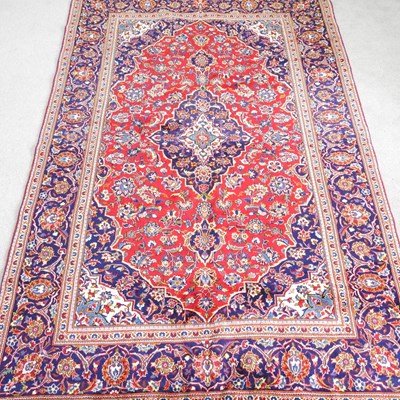Lot 153 - A Persian Kashan carpet, the central medallion...