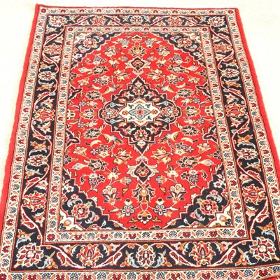 Lot 505 - A Persian Kashan rug, the central medallion on...
