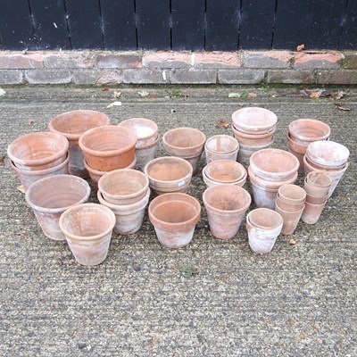 Lot 509 - A collection of terracotta garden pots
