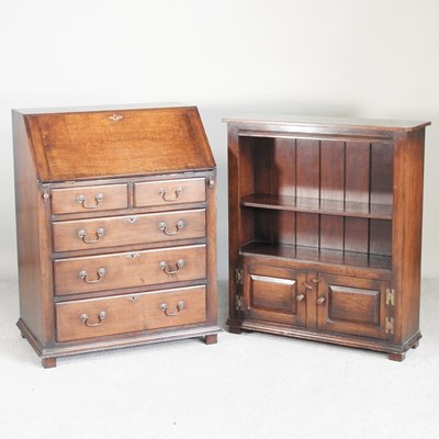 Lot 505 - A mid 20th century oak bureau, 84cm wide,...