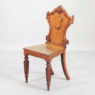Lot 473 - A Victorian carved oak hall chair, with a...