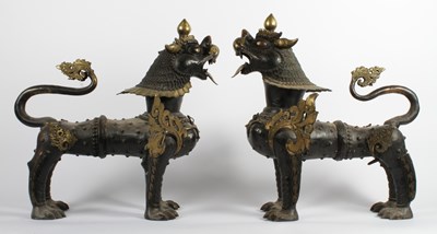Lot 27 - A pair of large Chinese bronze guardian lions...