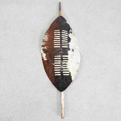 Lot 132 - An African hide tribal shield