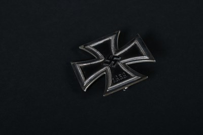 Lot 68 - A German 1939 Iron Cross medal, on a white...