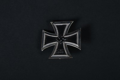 Lot 68 - A German 1939 Iron Cross medal, on a white...