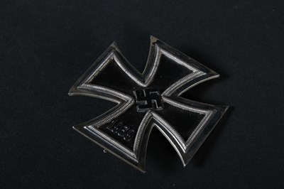 Lot 68 - A German 1939 Iron Cross medal, on a white...